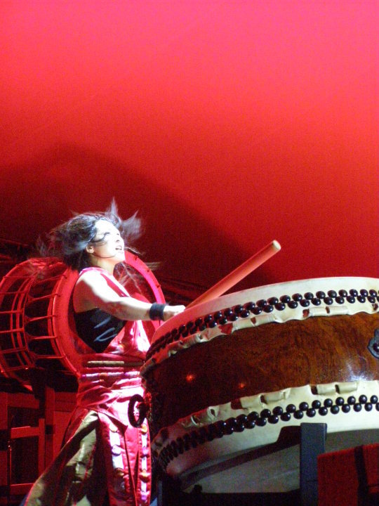 Japanese taiko drummer, Australia. Taiko have been used in Japan for centuries, though their exact origin is unclear. Often the taiko is said to have been conceived by the Shinto goddess of dawn, Ame no Uzume, while she tried to lure the sun goddess Amaterasu from a cave. In feudal Japan, the taiko was commonly used to motivate troops and transmit commands on the battlefield, though they have since found their way into a wide variety of traditional events like theatre, dance and religious festivals. They also make for an impressive stage performance. 