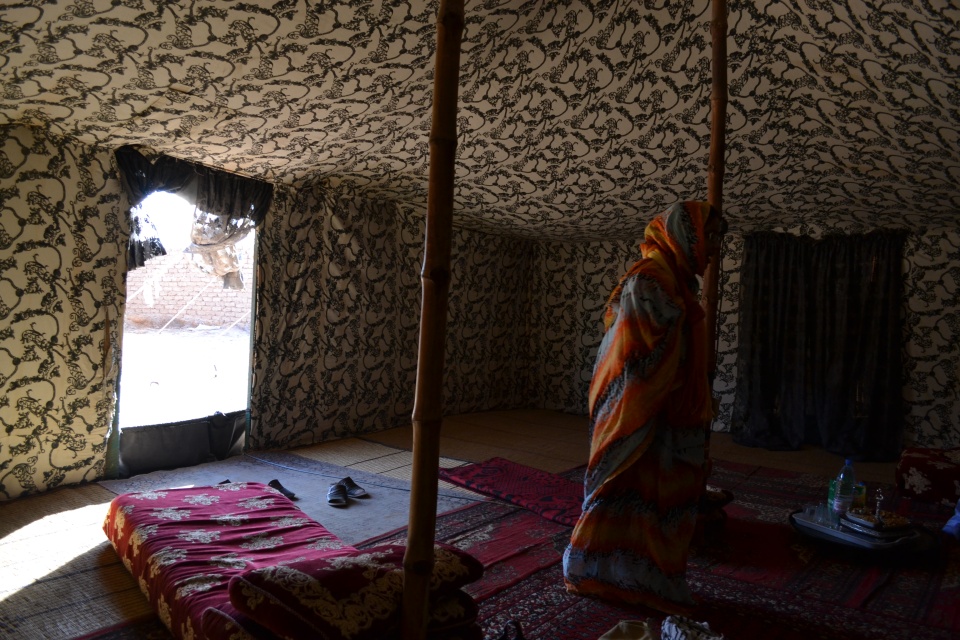 The inside of a jaima, the traditional Sahrawi tent. For centuries the people of Western Sahara have used tents like this while moving across the desert. By the 9th Century, the region may have been a notable trade route for caravans between Marrakesh and Tombouctou, making tents like the jaima a logical choice of shelter for people on the move. Sahrawi I met living under Moroccan occupation said that authorities have banned the erecting of jaima anywhere in the desert. In the Polisario camps, however, along with mudbrick huts these tents are the only shelter for many families.